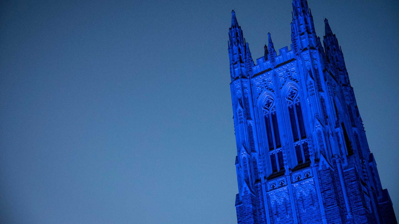 The Duke Chapel, bathed in blue light.